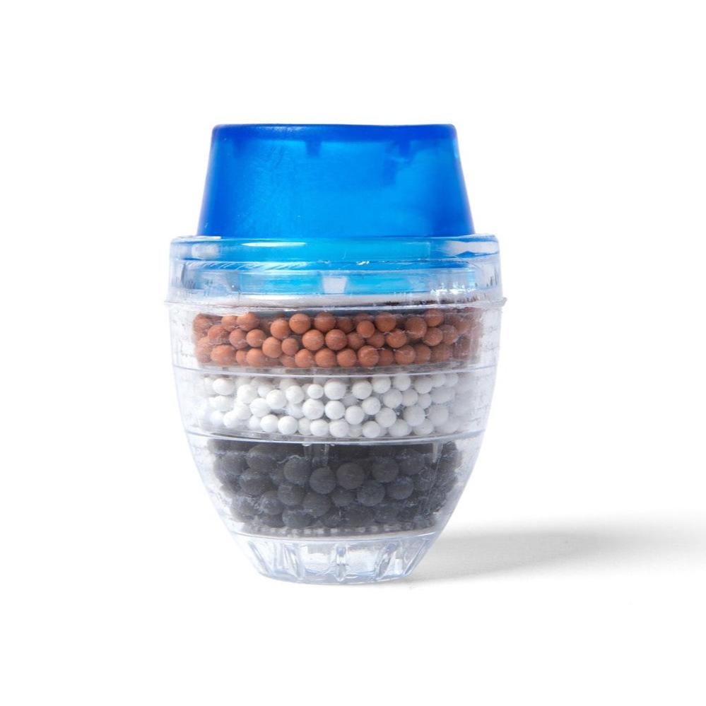 Water filter cartridge with three layers of colored beads and a blue top.